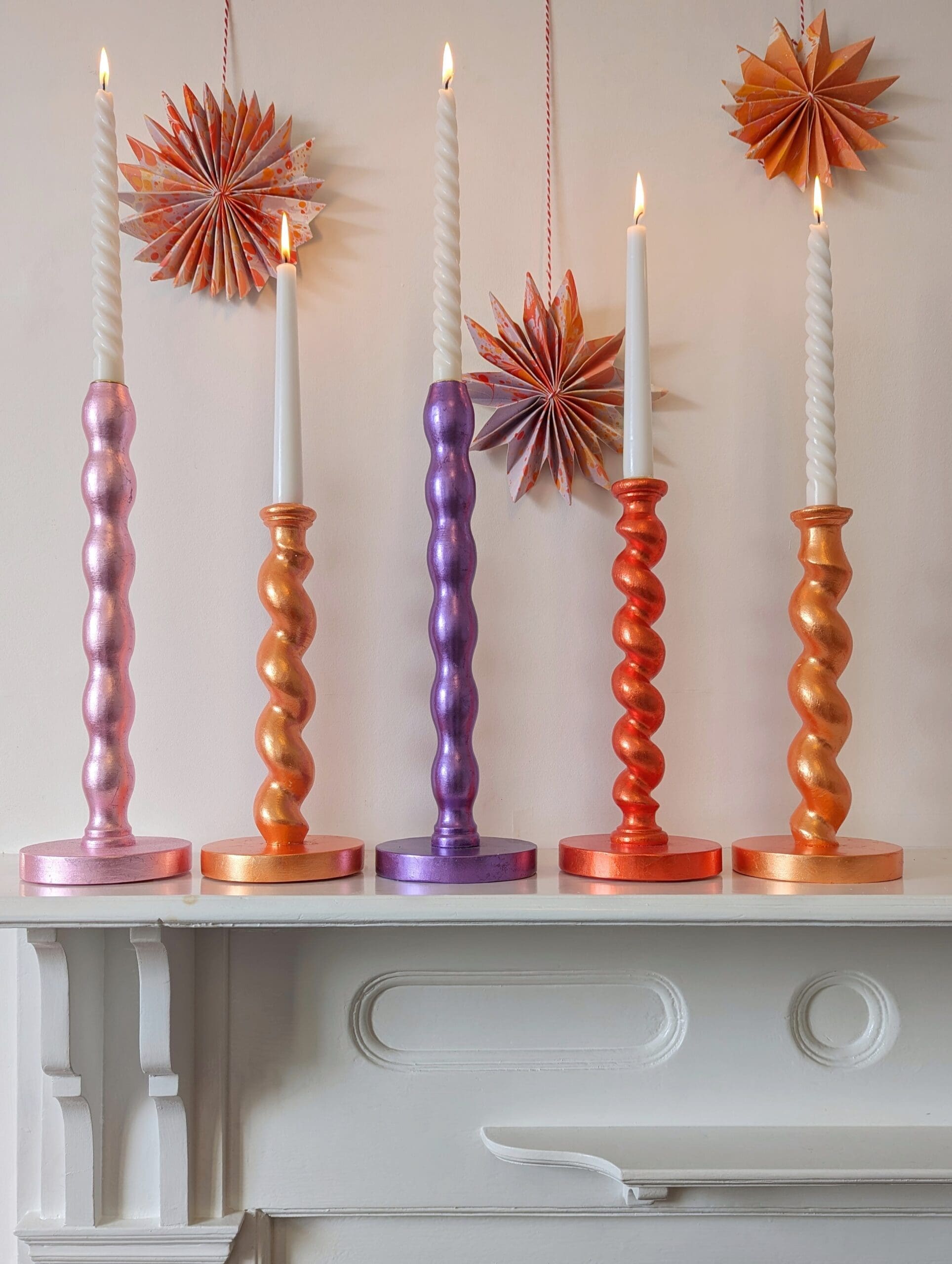 metallic candlesticks in a range of colours